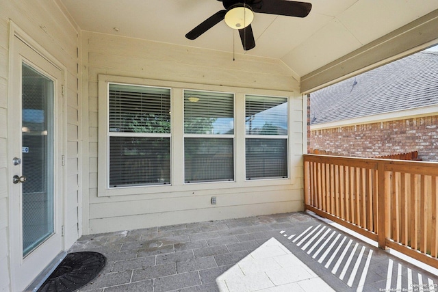 balcony featuring ceiling fan