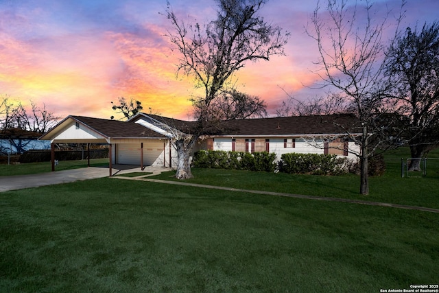 ranch-style house with a carport and a lawn