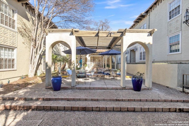 exterior space with a pergola