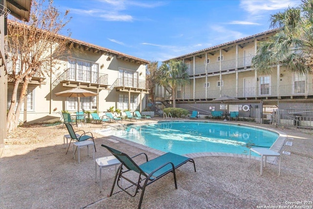 view of pool featuring a patio