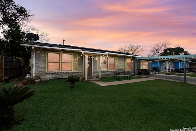 view of front of home with a yard