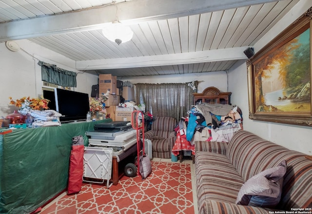 living room with beam ceiling