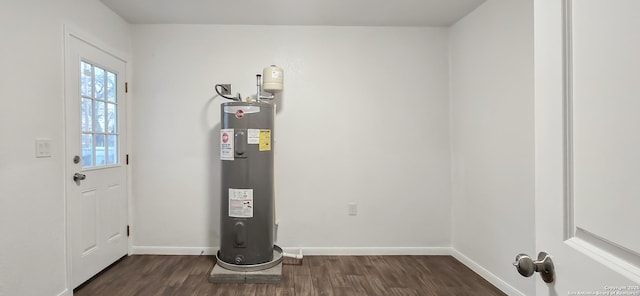 utility room featuring electric water heater