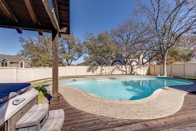 view of pool featuring a wooden deck