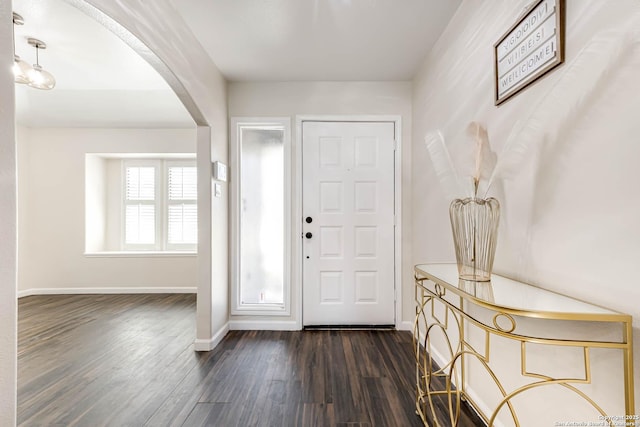 entrance foyer featuring dark wood-type flooring