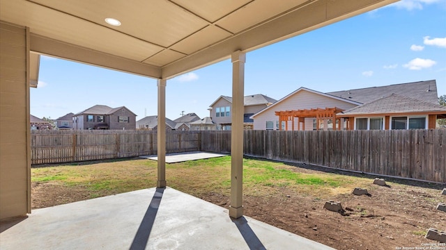 view of yard featuring a pergola and a patio area