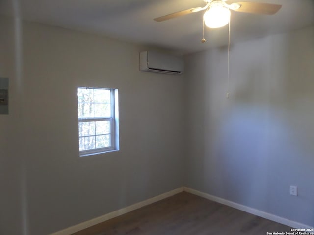 unfurnished room with dark wood-type flooring, ceiling fan, and a wall mounted air conditioner