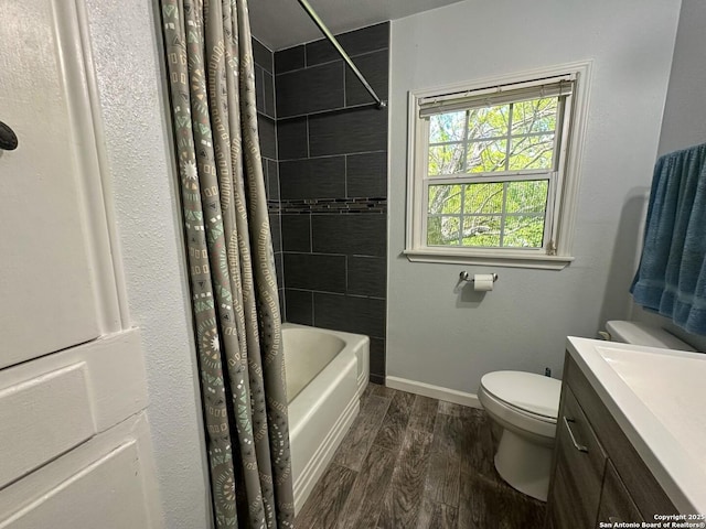 full bathroom with vanity, toilet, and shower / tub combo