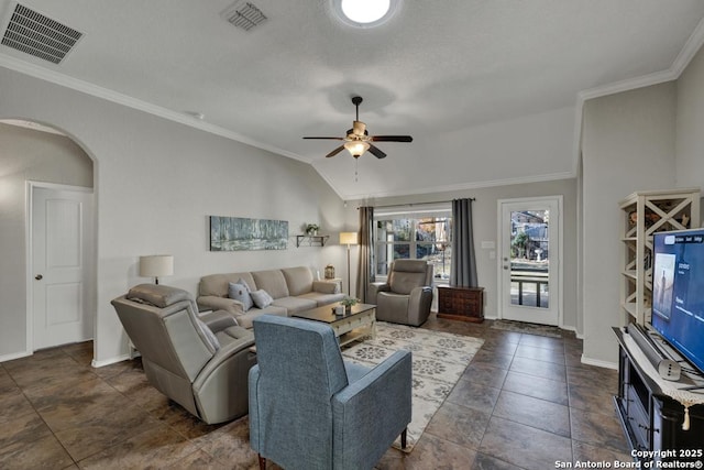 living room with vaulted ceiling, ornamental molding, and ceiling fan