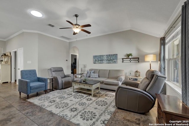 living room featuring ornamental molding, lofted ceiling, a healthy amount of sunlight, and ceiling fan