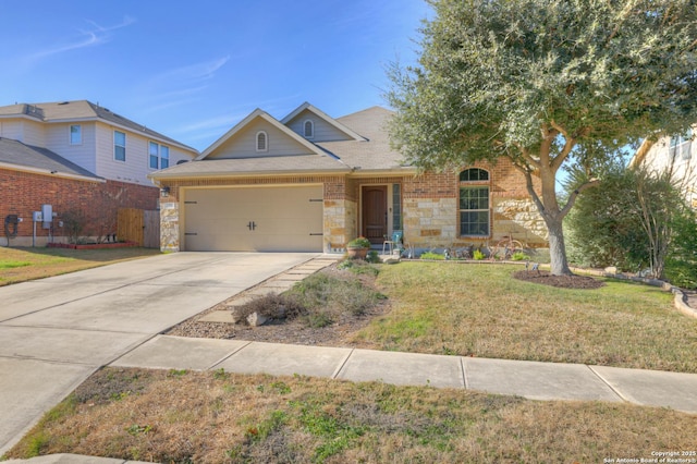 view of front of house featuring a garage and a front yard