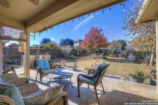 view of patio with ceiling fan and outdoor lounge area