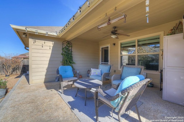 view of patio / terrace featuring ceiling fan