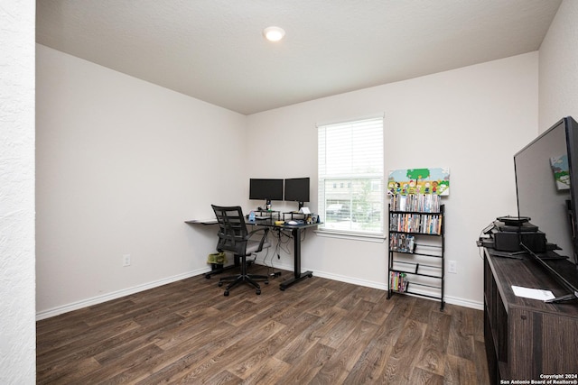 office with dark wood-type flooring