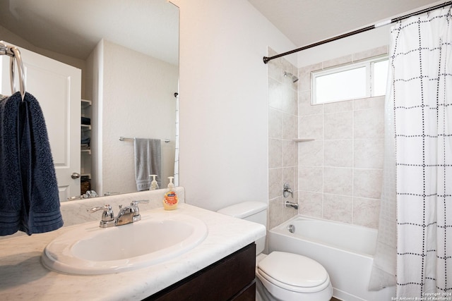 full bathroom with vanity, toilet, and shower / bath combo with shower curtain