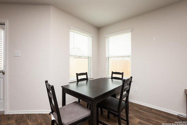 dining room featuring dark hardwood / wood-style floors