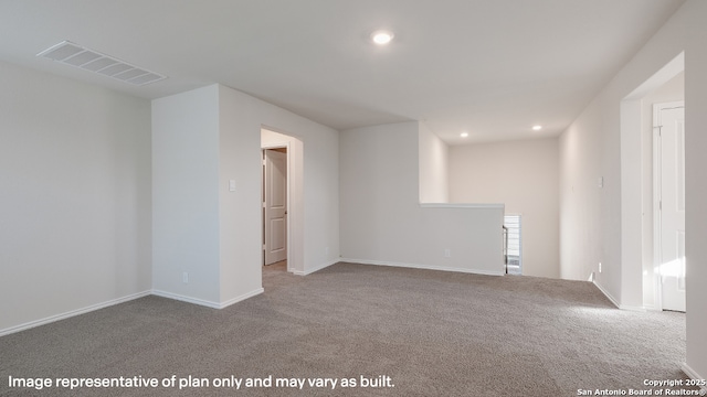 spare room featuring carpet flooring