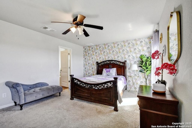 bedroom featuring light carpet and ceiling fan