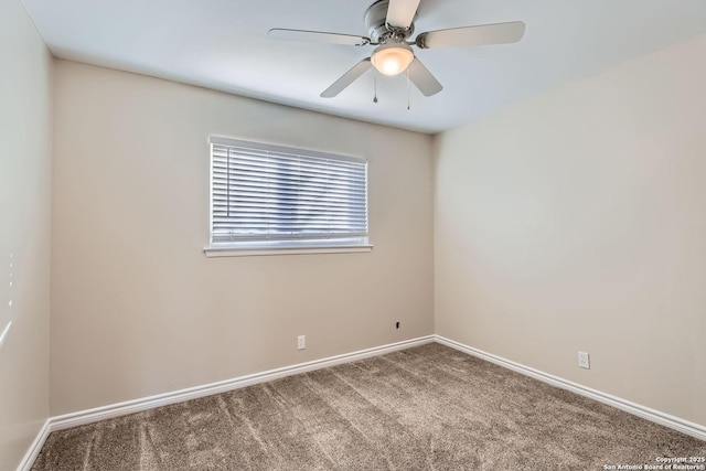 spare room featuring carpet floors and ceiling fan