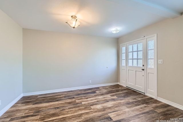 foyer entrance featuring dark hardwood / wood-style flooring