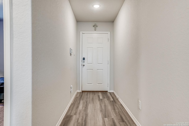 hall featuring light wood-type flooring