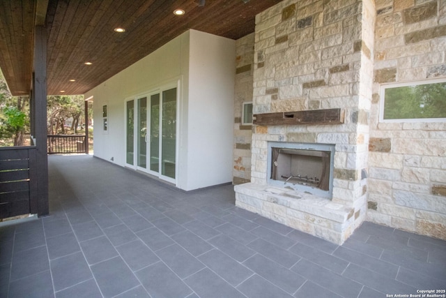 1255 Canyon Lk, Canyon Lake, TX 78133 - view of patio / terrace with an outdoor stone fireplace