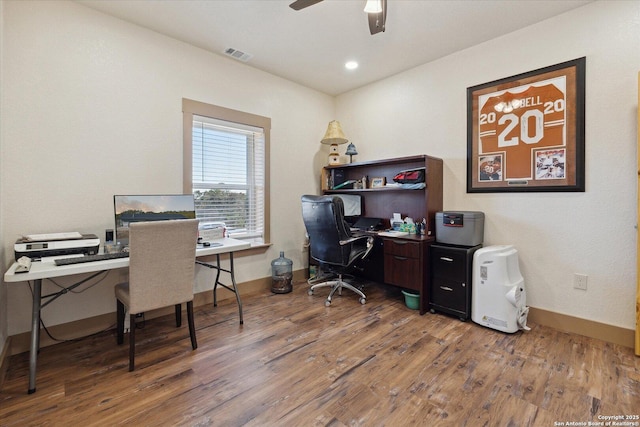 office with ceiling fan and wood-type flooring