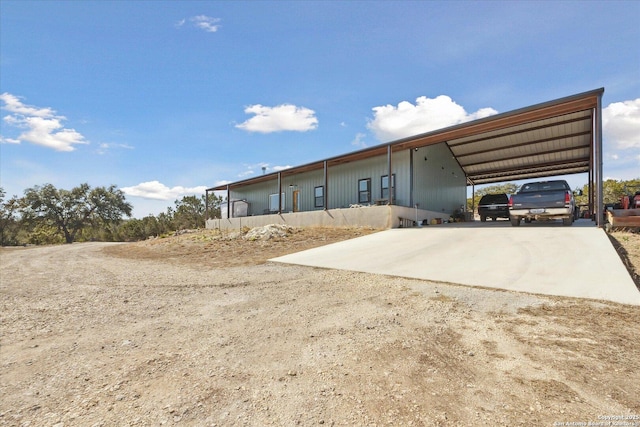 exterior space featuring a carport