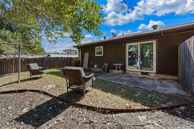 back of house featuring a patio