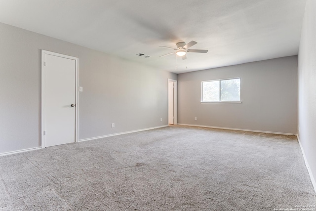 carpeted empty room with ceiling fan