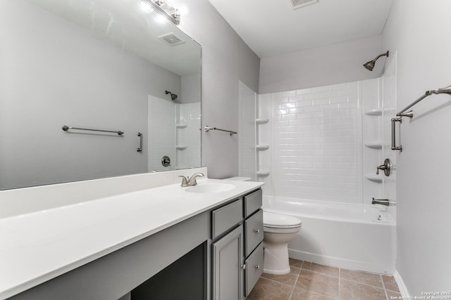 full bathroom with washtub / shower combination, vanity, toilet, and tile patterned floors