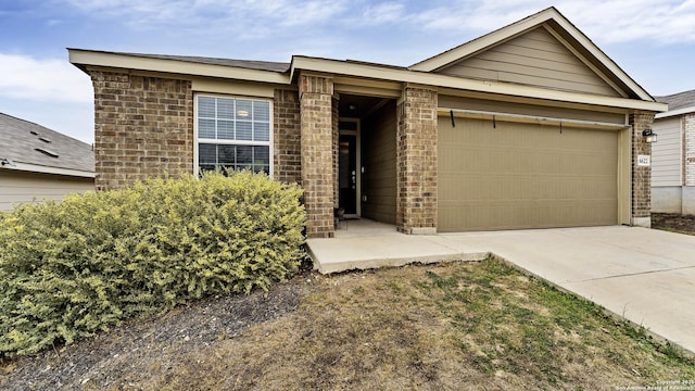 ranch-style home with a garage