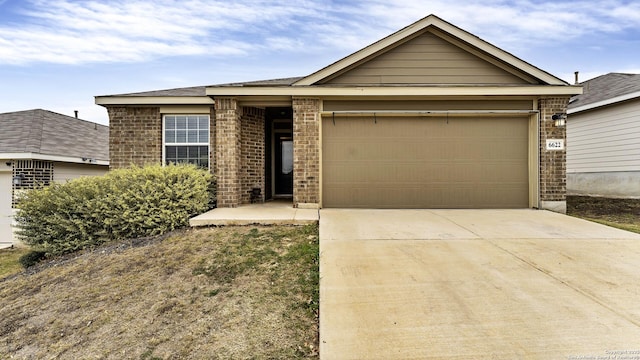 ranch-style home featuring a garage