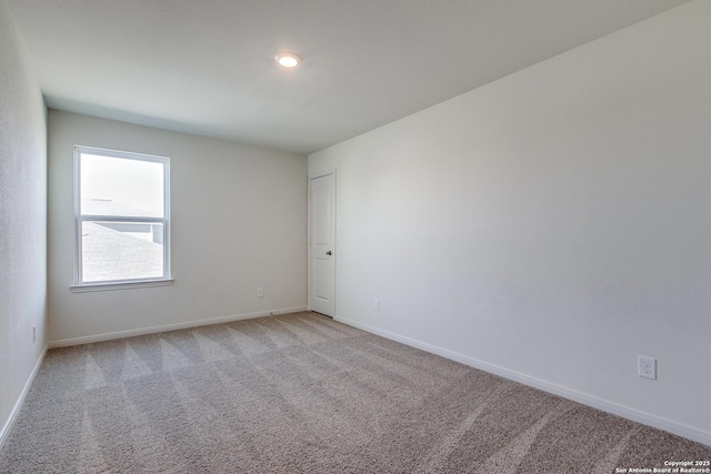 view of carpeted spare room