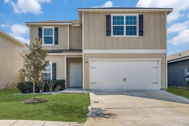 view of front of property featuring a garage and a front lawn