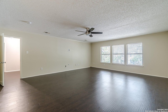 unfurnished room featuring ceiling fan, ornamental molding, dark hardwood / wood-style flooring, and a textured ceiling