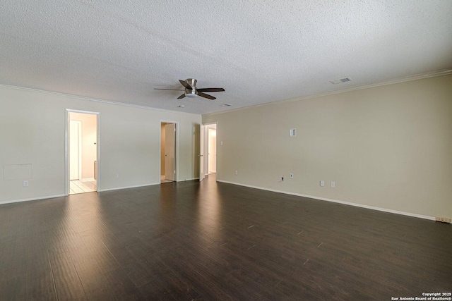 unfurnished room with a textured ceiling, dark wood-type flooring, ornamental molding, and ceiling fan