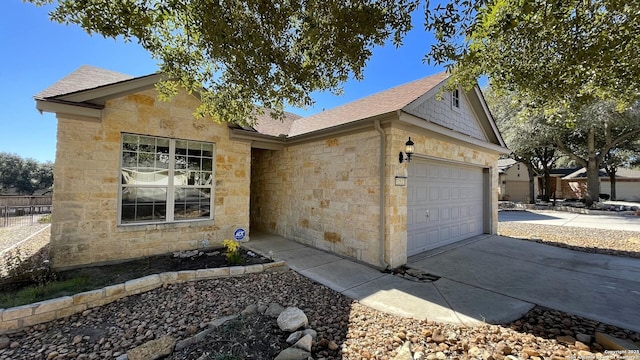 single story home featuring a garage