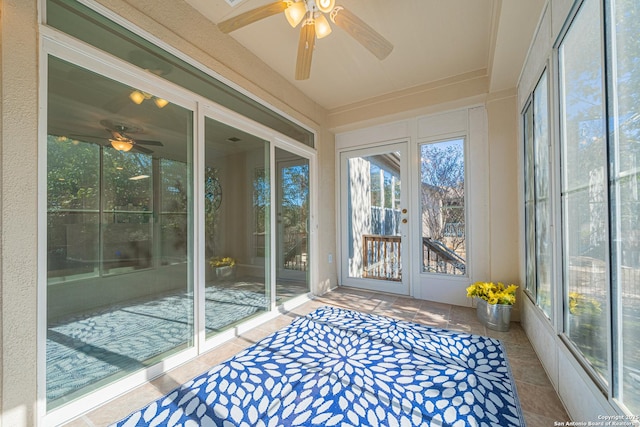 sunroom / solarium with ceiling fan