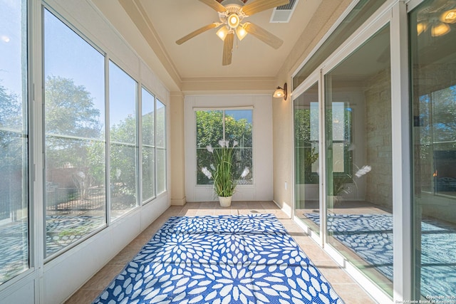 sunroom / solarium with ceiling fan