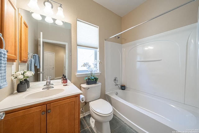 full bathroom with vanity, toilet, and shower / bath combination