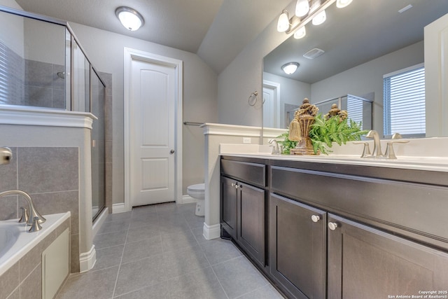 full bathroom featuring vanity, toilet, tile patterned flooring, and shower with separate bathtub