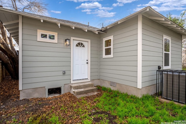 property entrance with central air condition unit