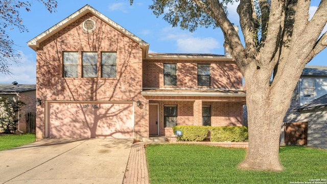 view of front facade with a garage and a front yard