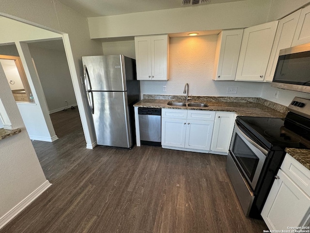 kitchen featuring white cabinetry, sink, and stainless steel appliances