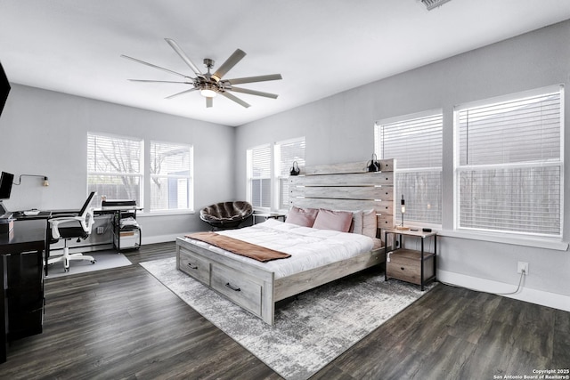 bedroom with dark wood-type flooring and ceiling fan