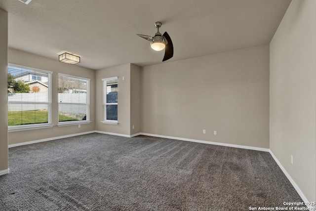 unfurnished room featuring carpet flooring and ceiling fan