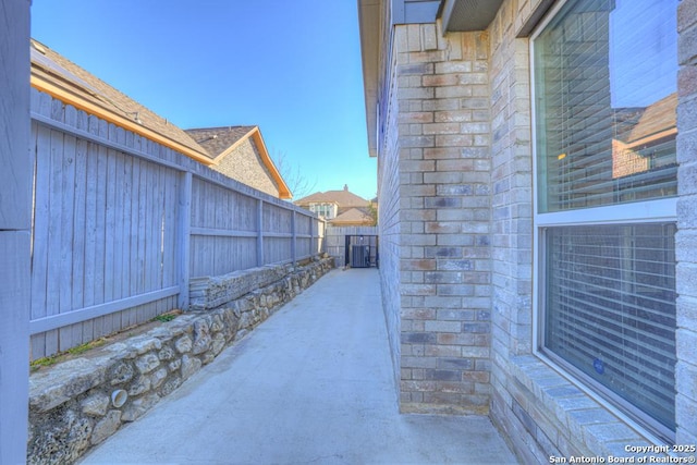 view of patio / terrace with central AC unit