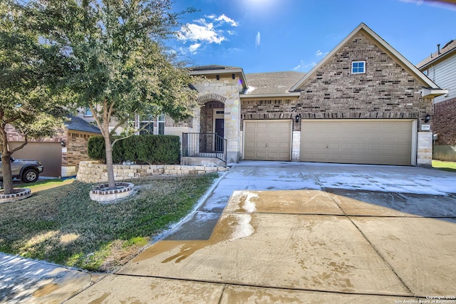 view of front of property featuring a garage