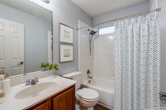 full bathroom with shower / bath combination with curtain, vanity, and toilet